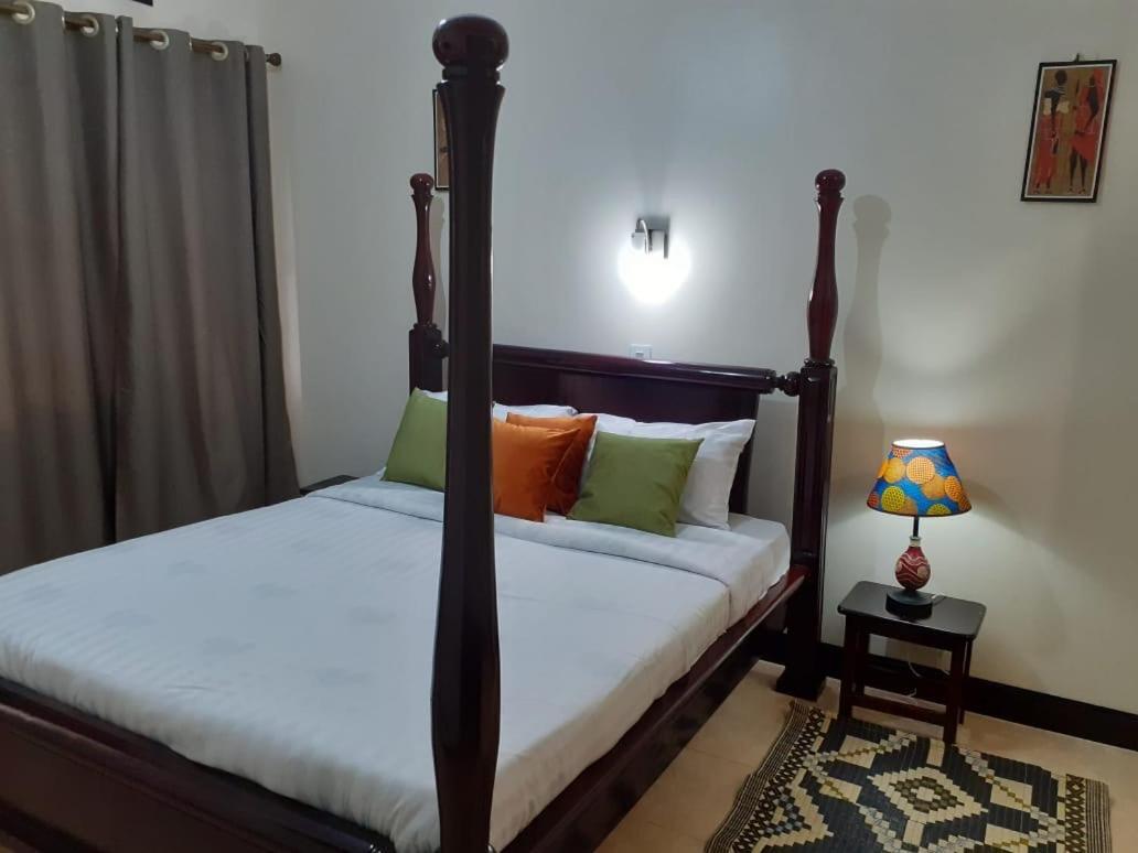 Okra House Hotel Entebbe Exterior photo